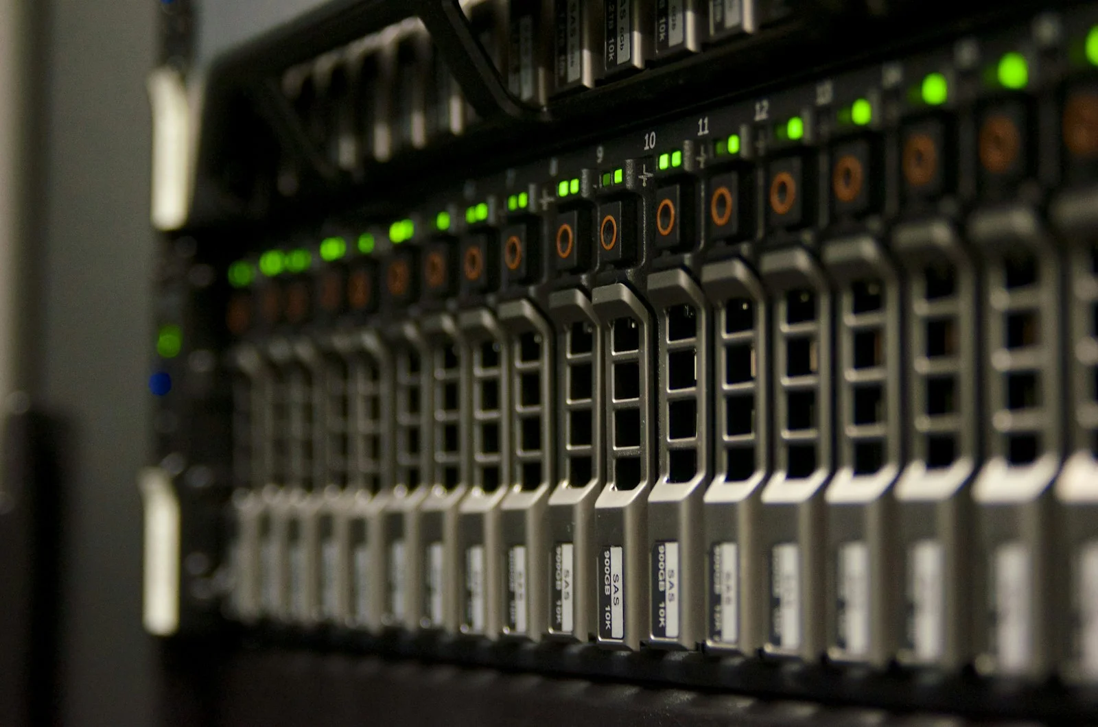 Server rack in a data centre with green status lights